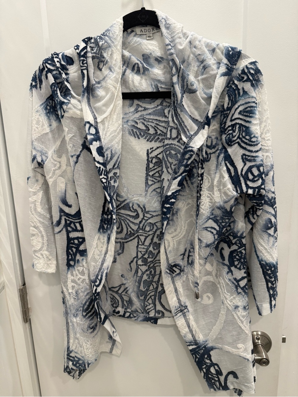 Adore White and Light Blue top which looks like a jacket